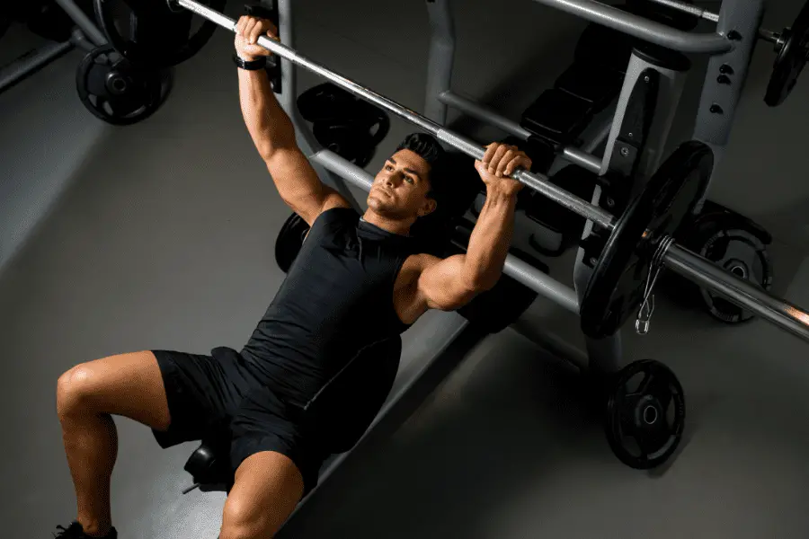 Image of a man bench pressing