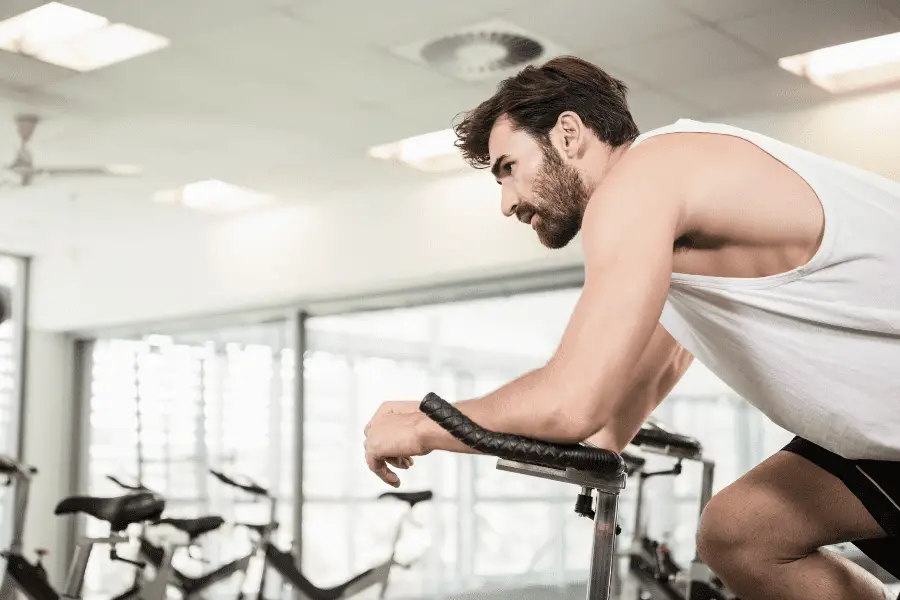 Image of a man using exercise bike.